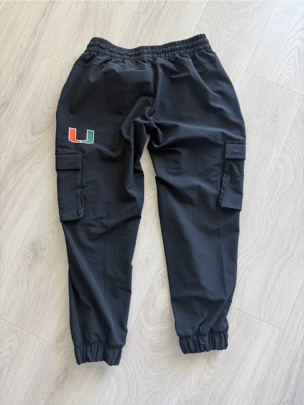 Black Men's University of Miami Adidas Track Pants with Elastic Cuffs